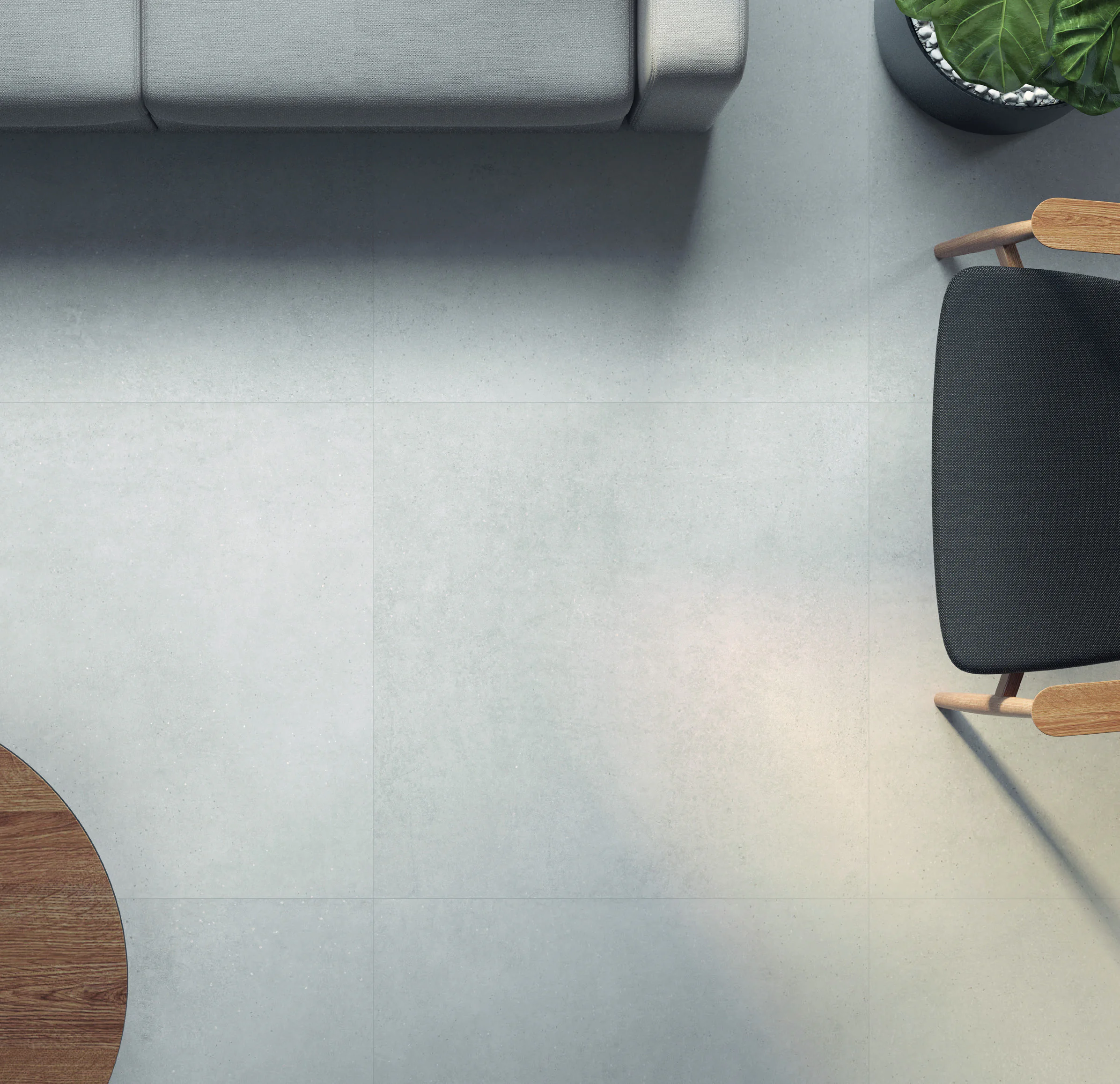 Argenta Gravel White vloertegels 90×90 in een woonkamer, van bovenaf
