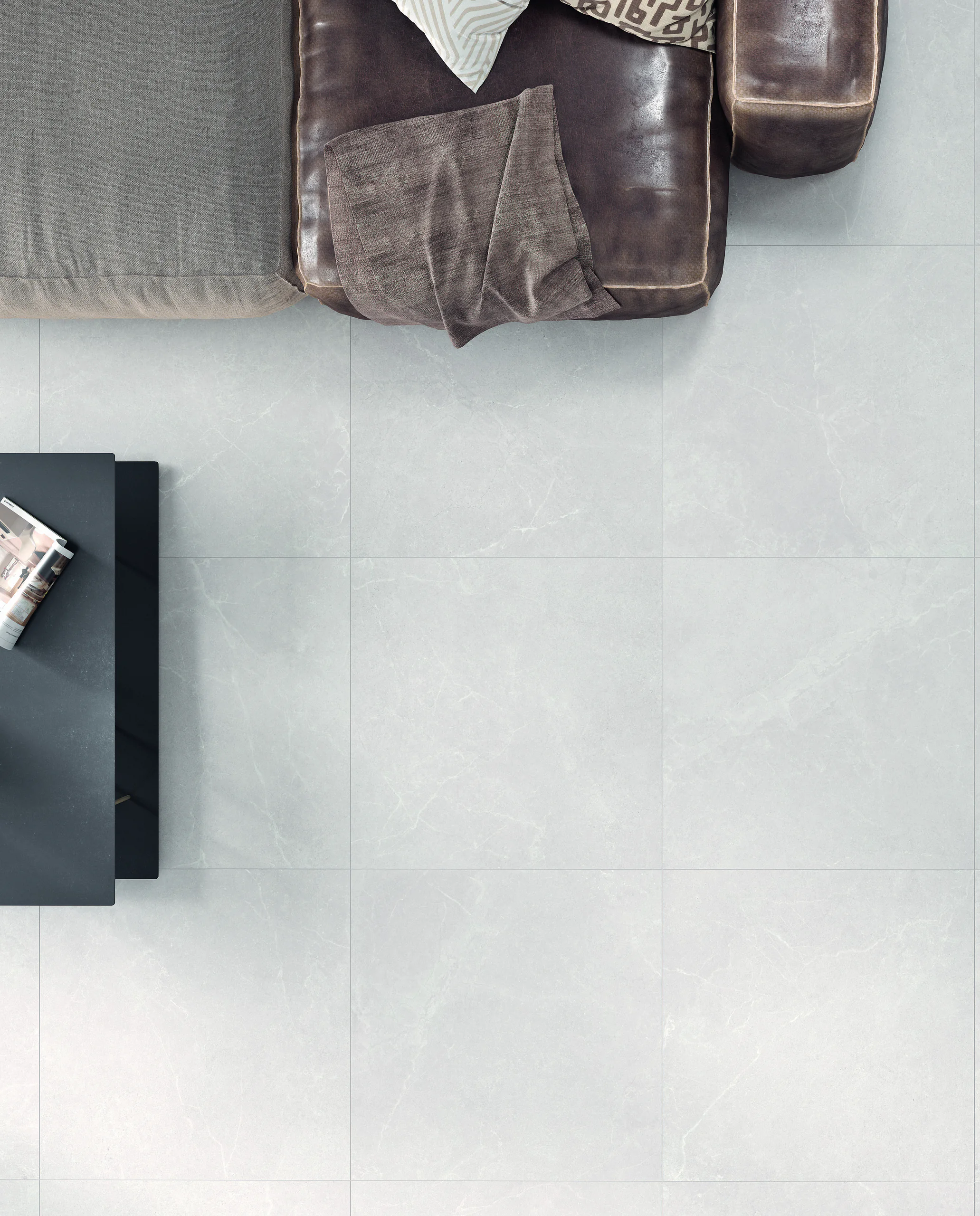 Argenta Storm White vloertegels 90×90 in een slaapkamer, van bovenaf