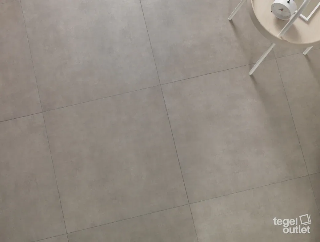 Photo d'ambiance : sol en carreaux taupe aspect béton, vu d'en haut