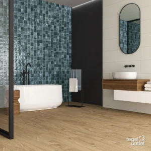 Ecoceramic Cool Blue glanzende wandtegels met reliëf van vierkante tegeltjes in een badkamer