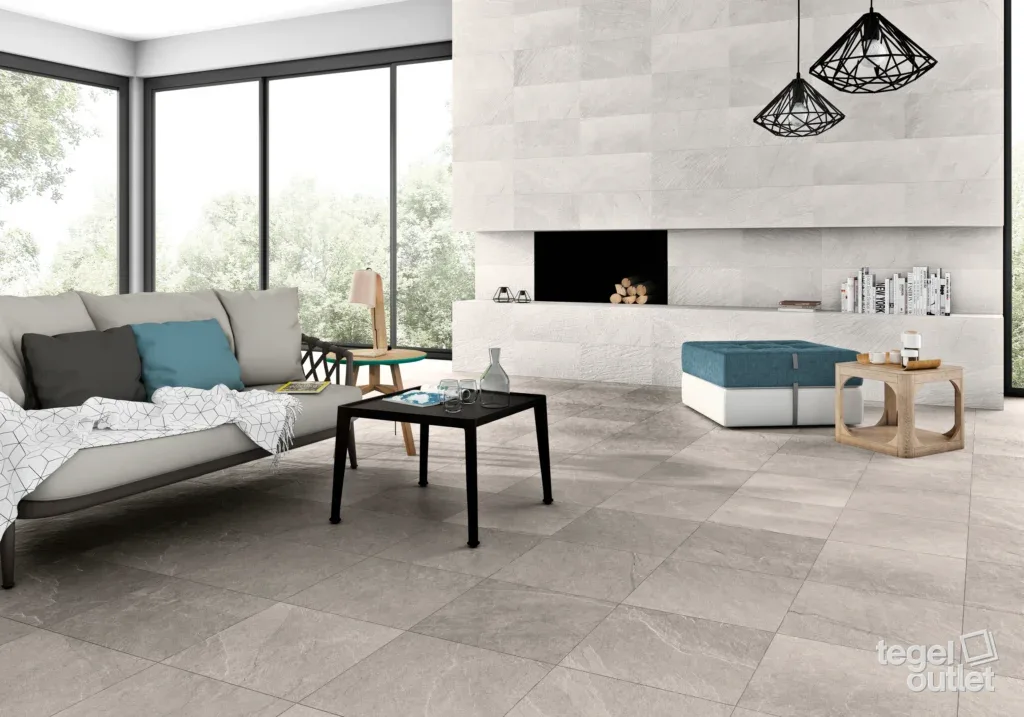 Salon avec des carreaux effet pierre naturelle Argenta Dorset : Moon au mur et Smoke au sol