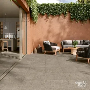 Photo d'ambiance : cuisine avec un sol en carreaux brun taupe aspect pierre naturelle et une terrasse dans la version antidérapante