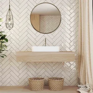 Carreaux muraux brillants Ecoceramic Harlequin Bianco posés en bâtons rompus dans une salle de bains