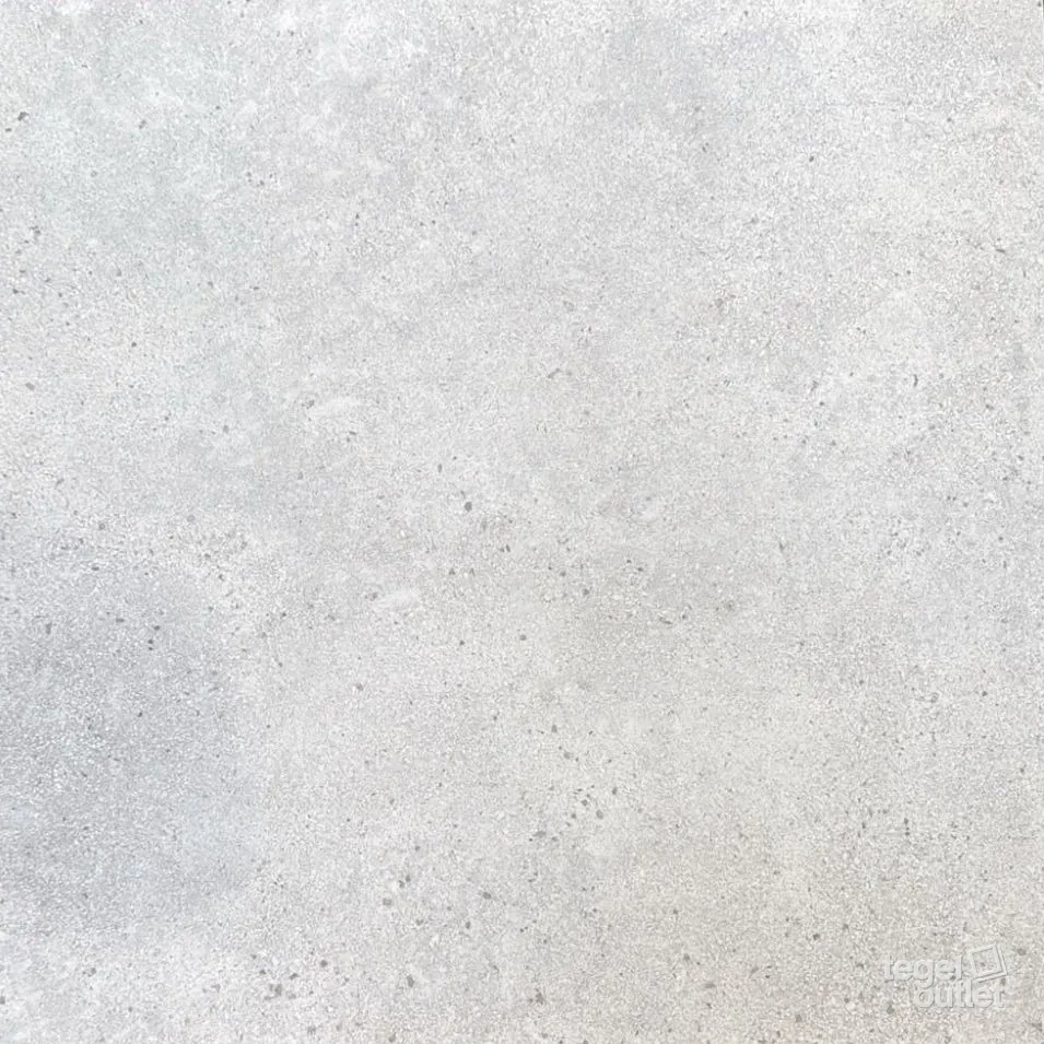 Limestone Ivory 60x60: één tegel in een lichte, zachte kleur met fijne lichte en donkere spikkels, recht van boven