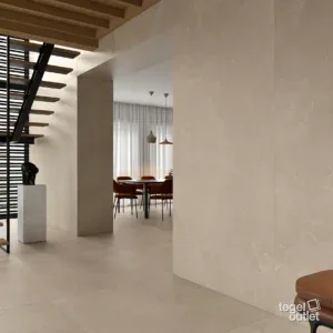 Dalles murales Argenta Storm Earth 120×280 et carreaux de sol dans un hall avec escalier ouvert
