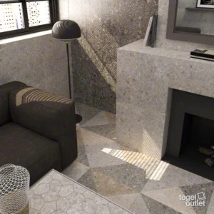 Vives Ceppo di Gre Cemento vloer met mozaïek Aymaras Gris en decor Oriyas in een woonkamer
