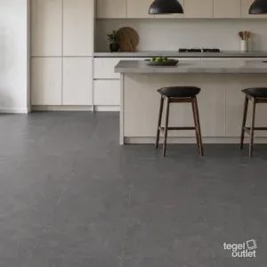 Sfeerbeeld (illustratie): woonruimte of badkamer met tegels in antraciet