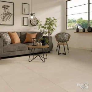 Navarti Ziro Crema betonlook vloertegels in een woonkamer