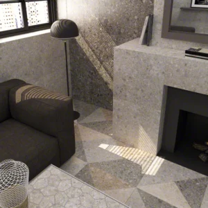 Vives Ceppo di Gre Cemento vloer met mozaïek Aymaras Gris en decor Oriyas in een woonkamer